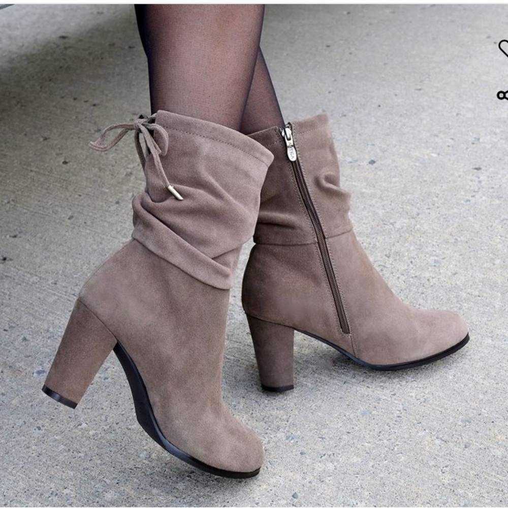 Never worn suede boots.